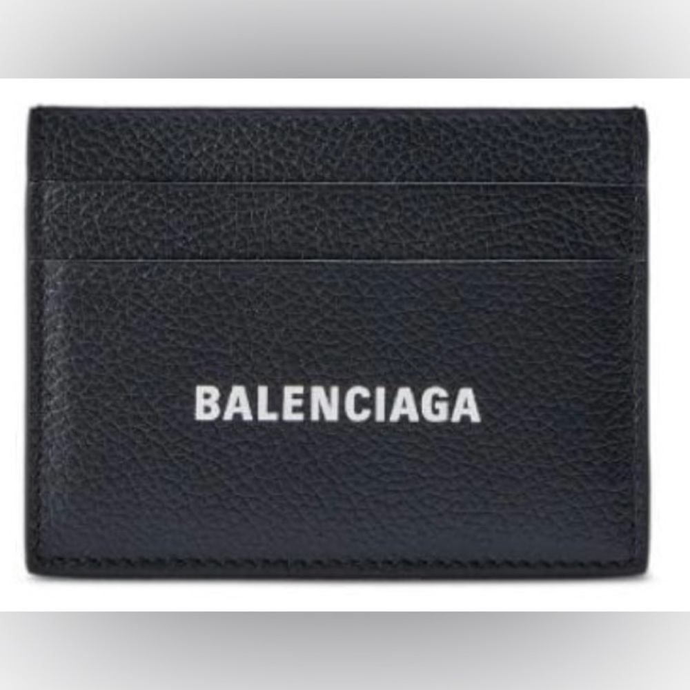 Balenciaga
Cash logo-print card holder